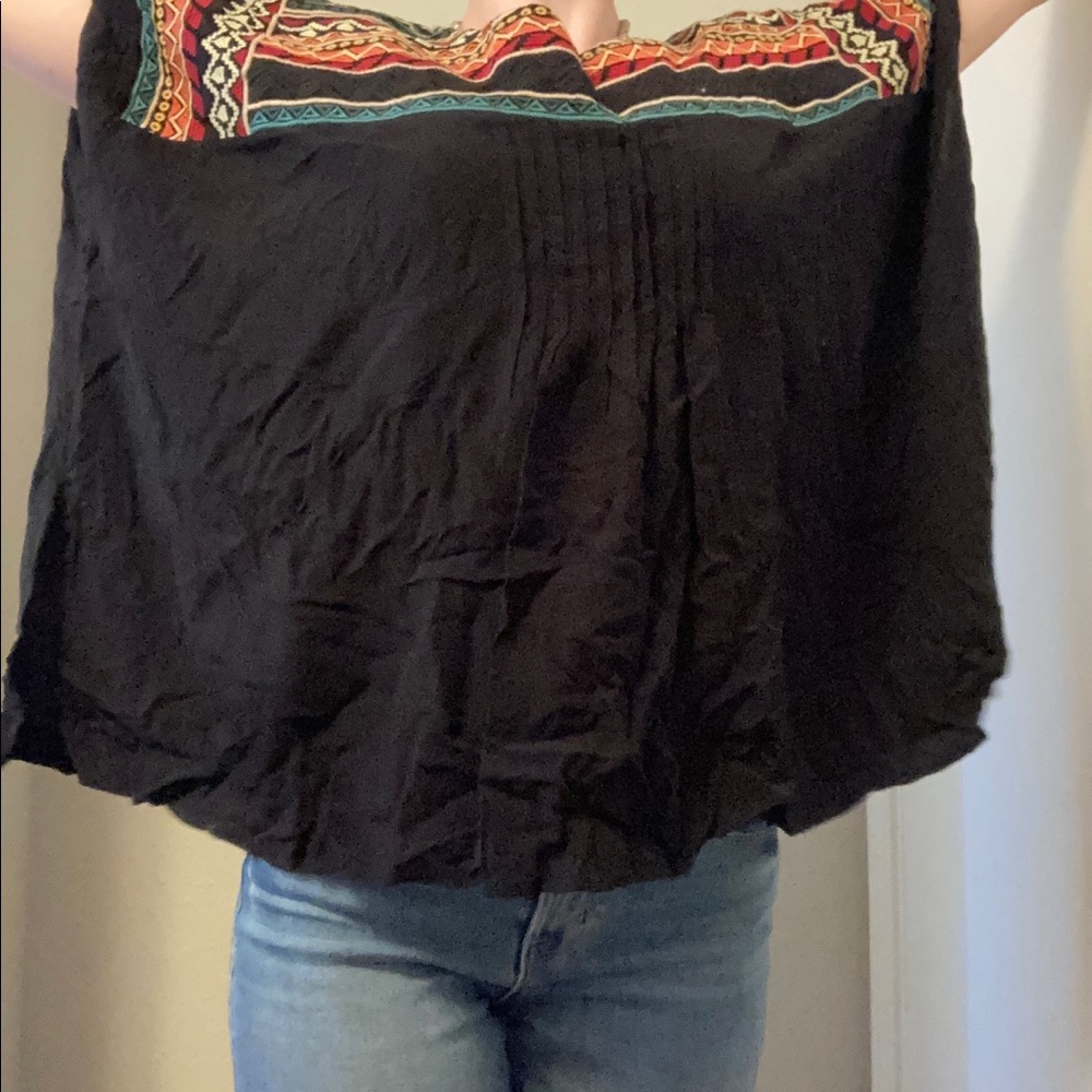 Size small oversized black and rainbow shirt with slit in both sides
